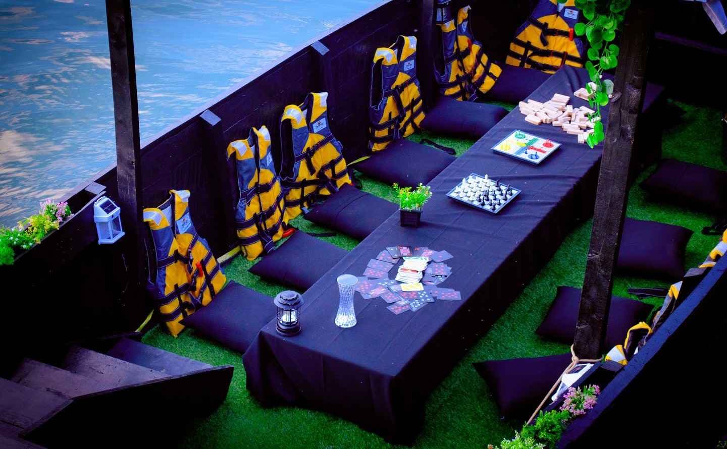 Inganji Bateaux Noir luxury boat on Lake Kivu at sunset, Rwanda